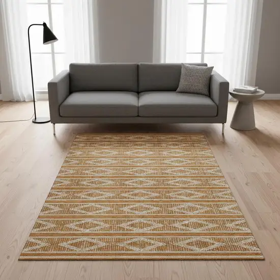Rust And Ivory Geometric Washable Area Rug With UV Protection Photo 2