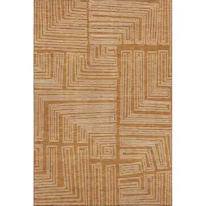 Photo of Rust And Ivory Geometric Washable Area Rug With UV Protection