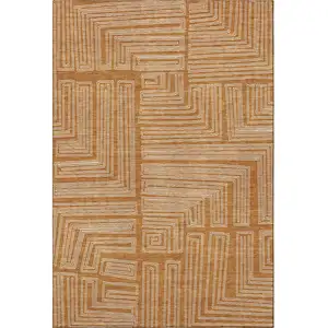 Photo of Rust And Ivory Geometric Washable Area Rug With UV Protection