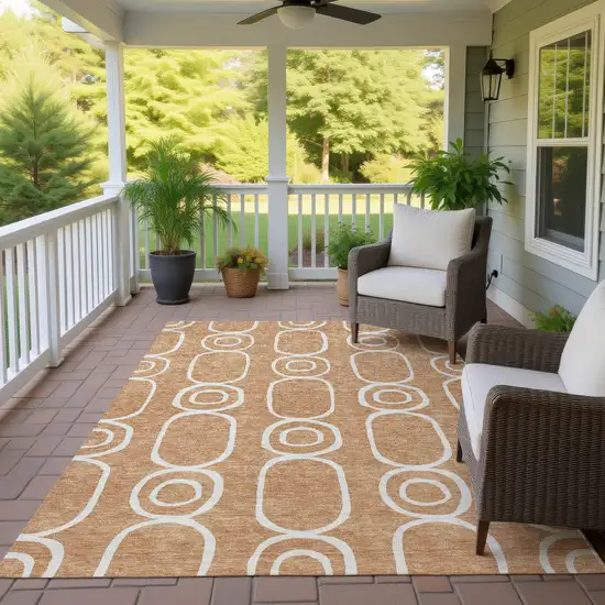 Rust And Ivory Geometric Washable Indoor Outdoor Area Rug Photo 9