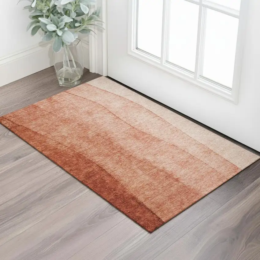 Rust And Ivory Ombre Washable Area Rug With UV Protection Photo 1
