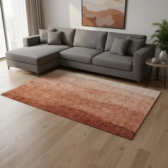 Rust And Ivory Ombre Washable Area Rug With UV Protection Photo 1