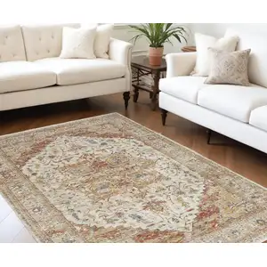 Photo of Rust And Ivory Oriental Distressed Area Rug