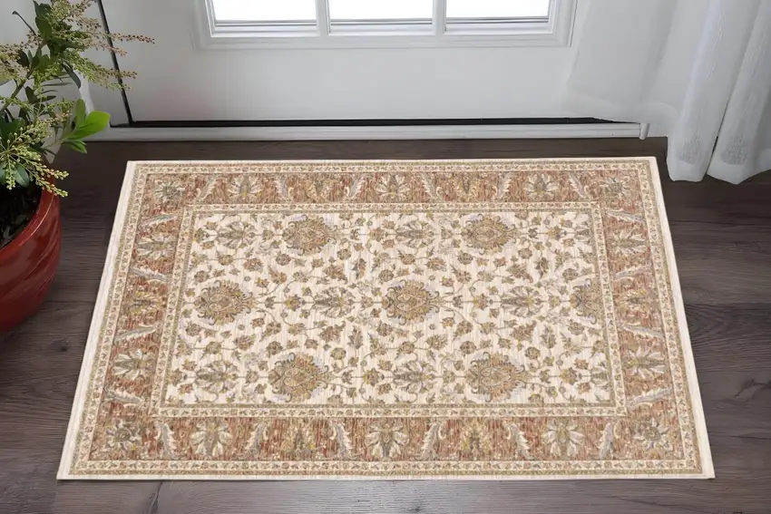 Rust And Ivory Oriental Power Loom Stain Resistant Area Rug With Fringe Photo 1