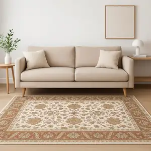Photo of Rust And Ivory Oriental Power Loom Stain Resistant Area Rug With Fringe