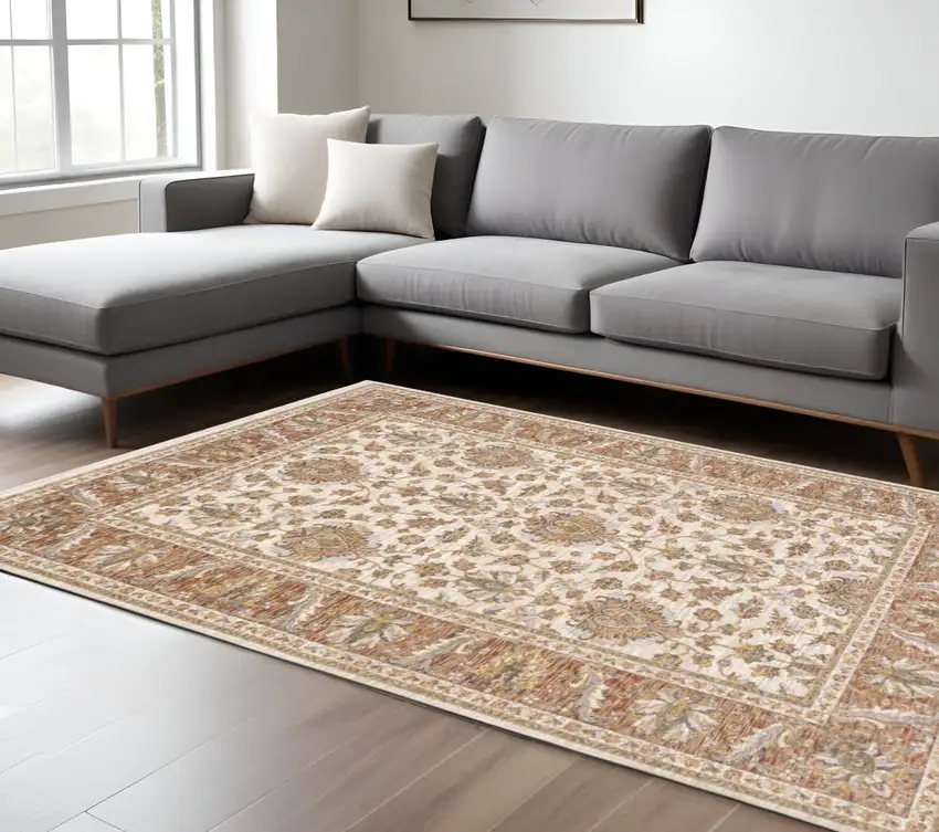 6' X 9' Rust And Ivory Oriental Power Loom Stain Resistant Area Rug With Fringe Photo 1