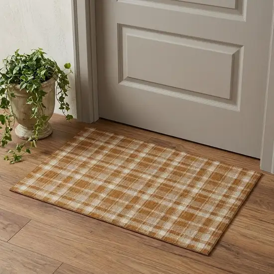 Rust And Ivory Plaid Washable Area Rug With UV Protection Photo 1