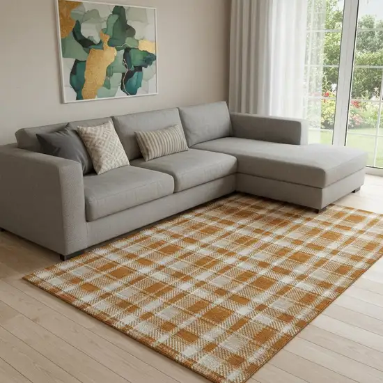 Rust And Ivory Plaid Washable Area Rug With UV Protection Photo 1