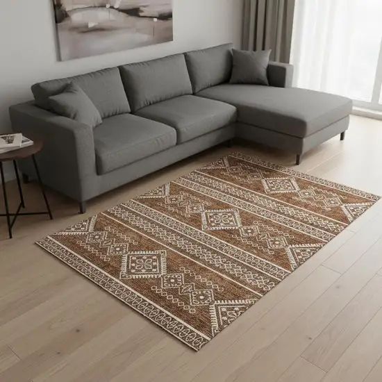 Rust And Ivory Southwestern Washable Area Rug With UV Protection Photo 2