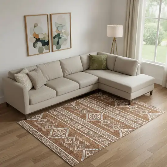 Rust And Ivory Southwestern Washable Area Rug With UV Protection Photo 1