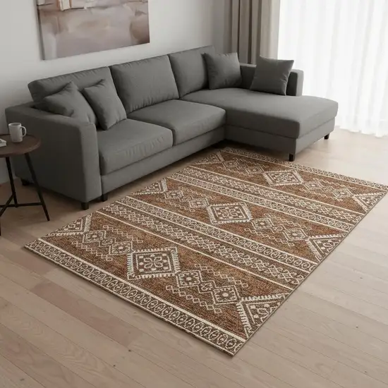 Rust And Ivory Southwestern Washable Area Rug With UV Protection Photo 2