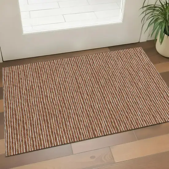 Rust And Ivory Striped Washable Area Rug With UV Protection Photo 1