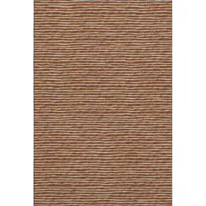 Photo of Rust And Ivory Striped Washable Area Rug With UV Protection