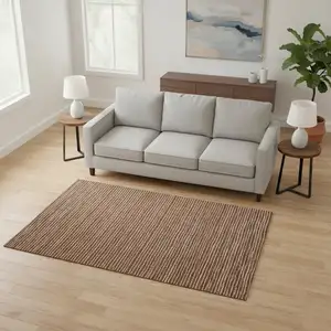 Photo of Rust And Ivory Striped Washable Area Rug With UV Protection