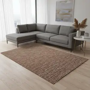 Photo of Rust And Ivory Striped Washable Area Rug With UV Protection