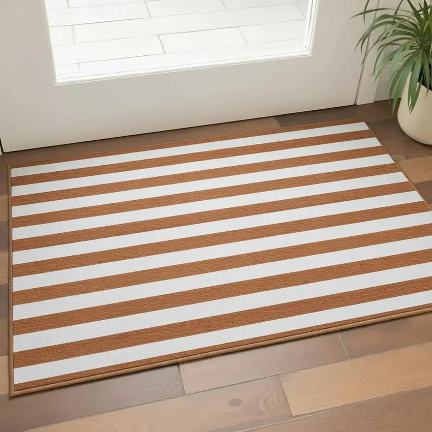Rust And Ivory Striped Washable Area Rug With UV Protection Photo 2