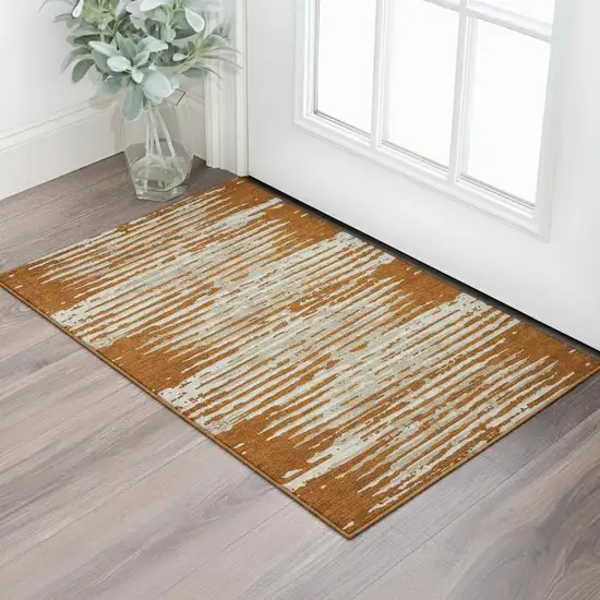 Rust And Ivory Striped Washable Area Rug With UV Protection Photo 1
