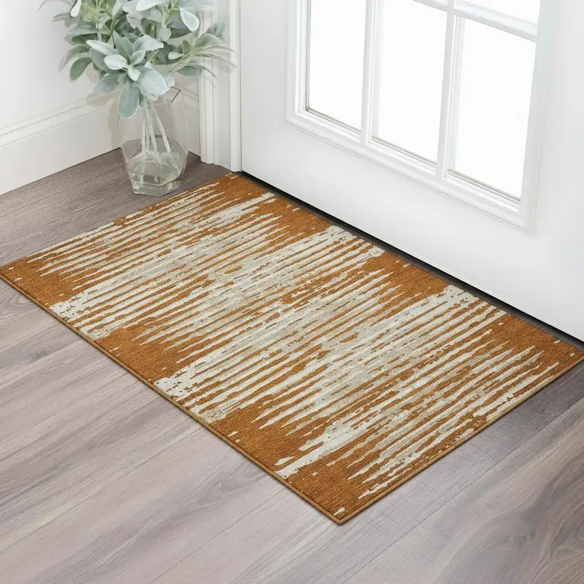 Rust And Ivory Striped Washable Area Rug With UV Protection Photo 1