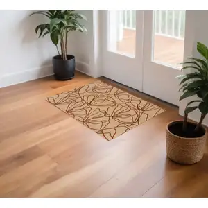 Photo of Rust And Off White Floral Washable Area Rug With UV Protection