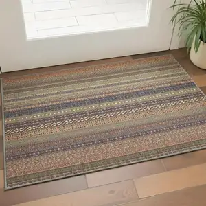 Photo of Rust And Purple Striped Washable Area Rug With UV Protection