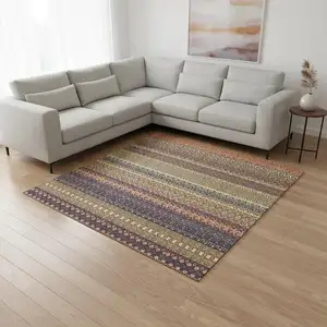 Photo of Rust And Purple Striped Washable Area Rug With UV Protection