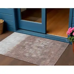 Photo of Rust And Silver Abstract Washable Indoor Outdoor Area Rug