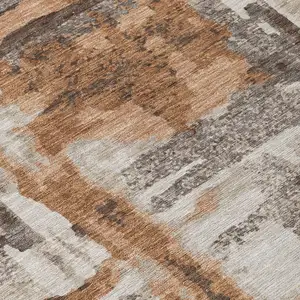 Photo of Rust And Taupe Abstract Washable Indoor Outdoor Area Rug