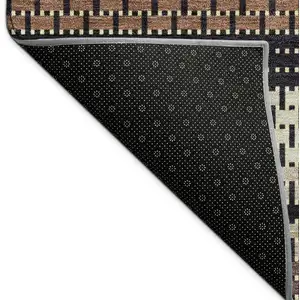 Photo of Rust Beige And Black Striped Washable Indoor Outdoor Area Rug