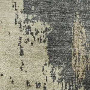 Photo of Rust Beige And Blue Abstract Washable Area Rug With UV Protection