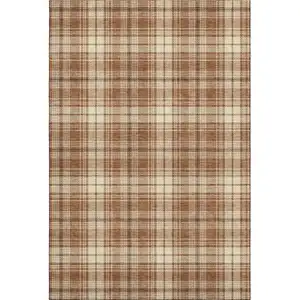 Photo of Rust Beige And Brown Plaid Washable Area Rug With UV Protection