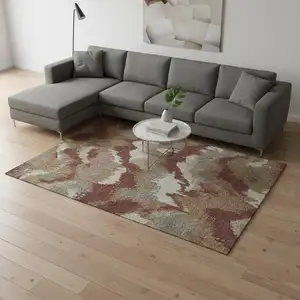 Photo of Rust Beige And Copper Abstract Washable Area Rug With UV Protection