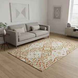 Photo of Rust Beige And Gold Floral Washable Area Rug With UV Protection