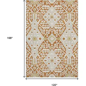 Photo of Rust Beige And Gold Floral Washable Area Rug With UV Protection