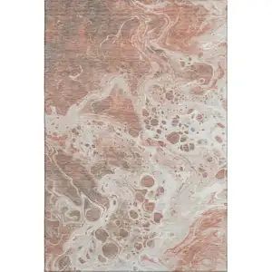 Photo of Rust Beige And Ivory Abstract Washable Area Rug With UV Protection