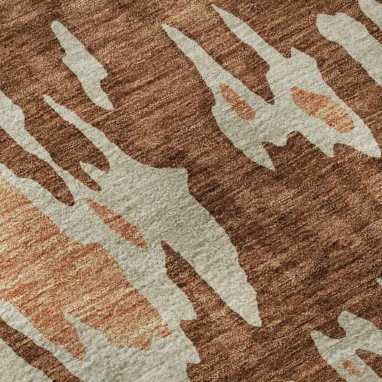 Rust Beige And Peach Abstract Washable Area Rug With UV Protection Photo 1