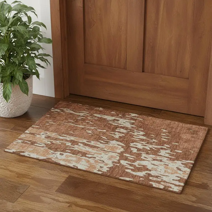 Rust Beige And Peach Abstract Washable Area Rug With UV Protection Photo 1