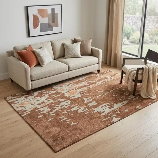 Rust Beige And Peach Abstract Washable Area Rug With UV Protection Photo 1