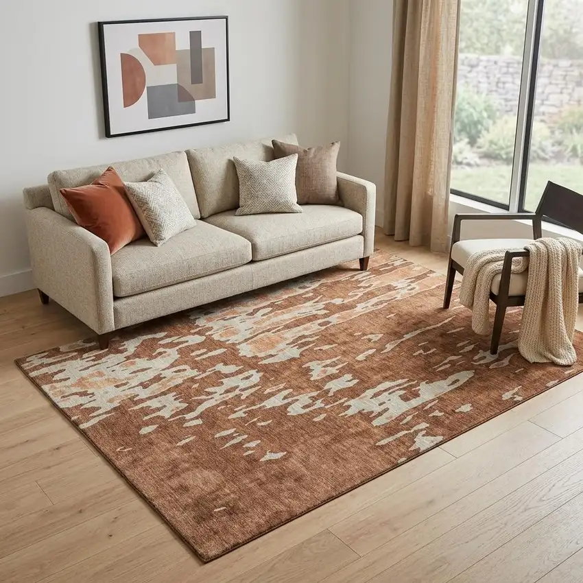 Rust Beige And Peach Abstract Washable Area Rug With UV Protection Photo 1