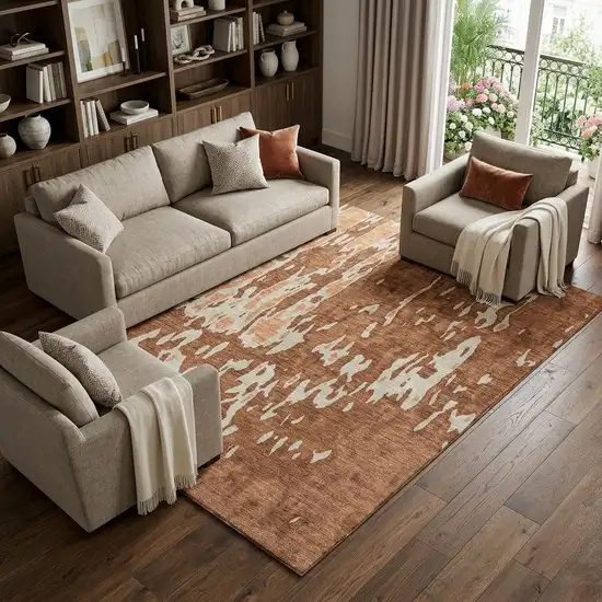 Rust Beige And Peach Abstract Washable Area Rug With UV Protection Photo 1