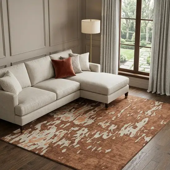 Rust Beige And Peach Abstract Washable Area Rug With UV Protection Photo 1