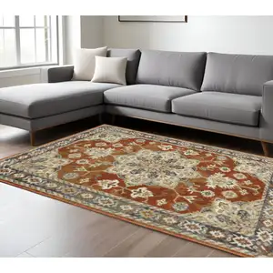 Photo of Rust Beige Teal Blue And Gold Oriental Power Loom Stain Resistant Area Rug