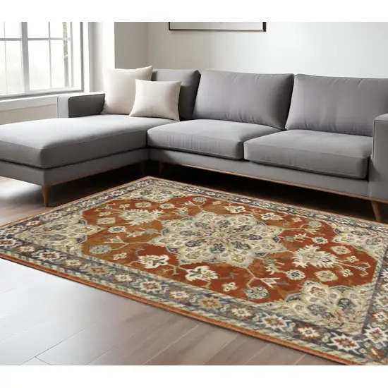 Rust Beige Teal Blue And Gold Oriental Power Loom Stain Resistant Area Rug Photo 1