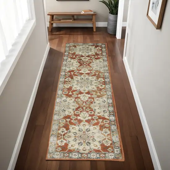 2' X 8' Rust Beige Teal Blue And Gold Oriental Power Loom Stain Resistant Runner Rug Photo 1