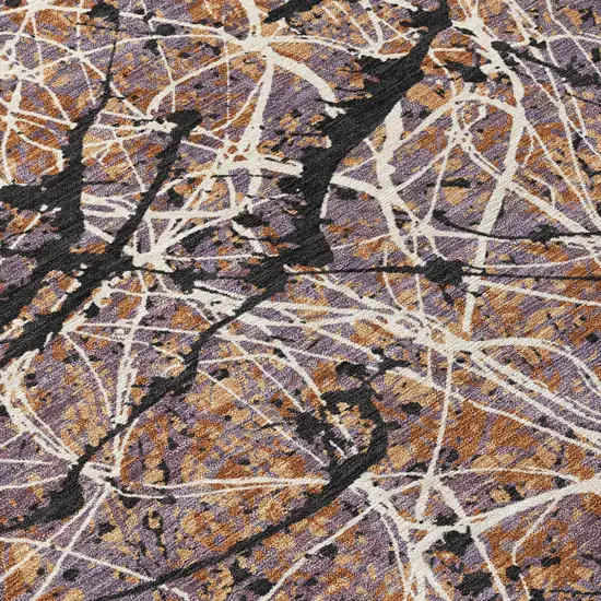 Rust Black And Ivory Abstract Washable Indoor Outdoor Area Rug Photo 1