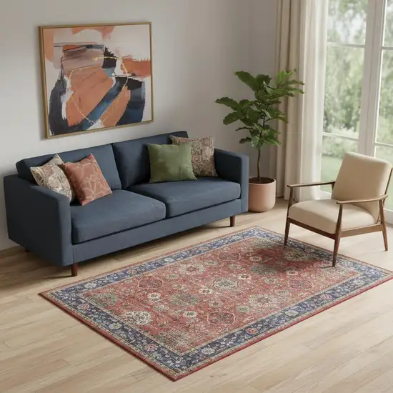 Rust Blue And White Oriental Distressed Area Rug Photo 1