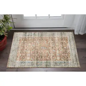 Photo of Rust Blue Ivory And Gold Oriental Printed Stain Resistant Non Skid Area Rug