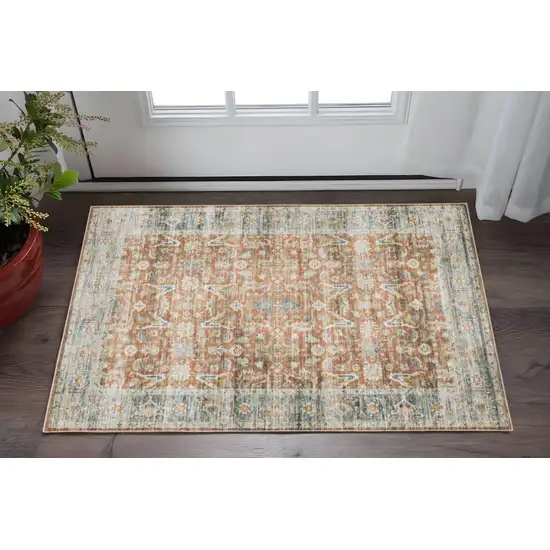 Rust Blue Ivory And Gold Oriental Printed Stain Resistant Non Skid Area Rug Photo 1