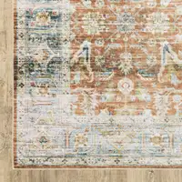 Photo of Rust Blue Ivory And Gold Oriental Printed Stain Resistant Non Skid Area Rug