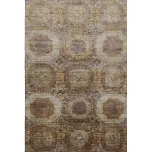 Photo of Rust Brown And Beige Abstract Geometric Washable Area Rug With UV Protection