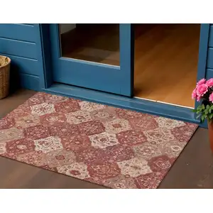 Photo of Rust Burgundy And Ivory Floral Medallion Washable Indoor Outdoor Area Rug